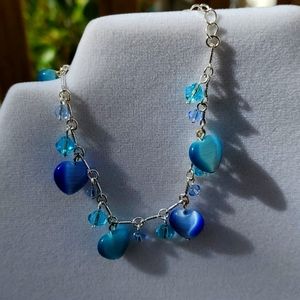 Vintage Avon cats eye bracelet and earrings set. blue shaded stones and silver